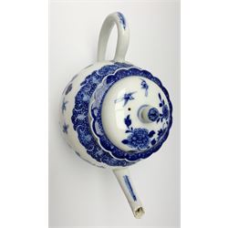 Chinese blue and white Kangxi porcelain teapot and cover, the body decorated with typical motifs including blossoming peonies, rockwork and pair of birds, the lobed cover with conforming decoration, including cover H15cm