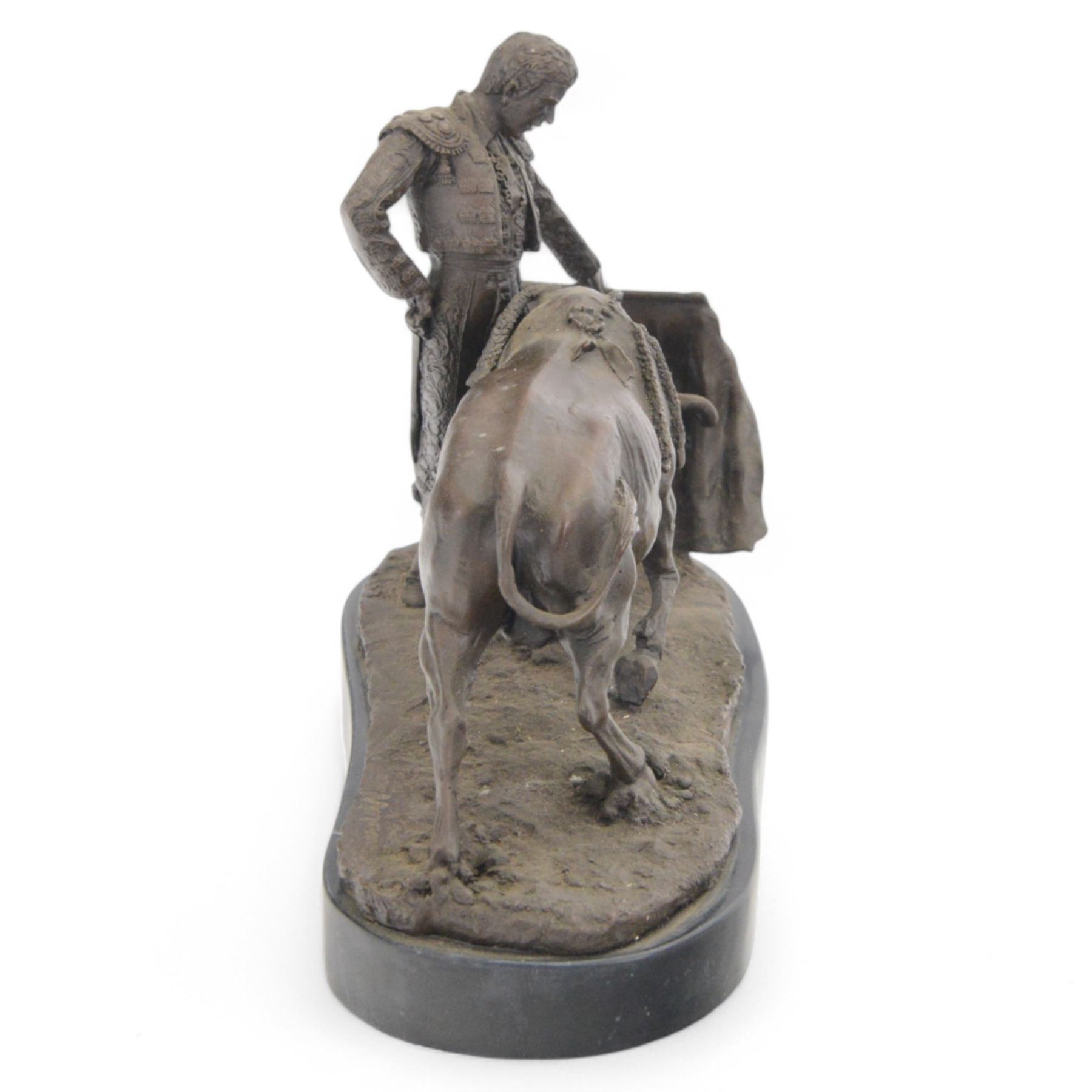 Bronzed figure of a matador and charging bull, signed Mene to the base, H21cm