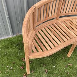 Solid teak serpentine garden bench - THIS LOT IS TO BE COLLECTED BY APPOINTMENT FROM DUGGLEBY STORAGE, GREAT HILL, EASTFIELD, SCARBOROUGH, YO11 3TX