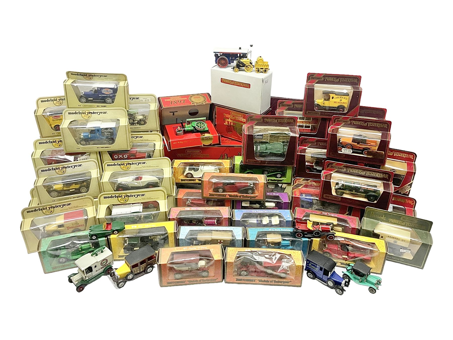 Matchbox - approximately sixty Models of Yesteryear to include special edition 1820 Passenger Coach and Horses, limited editions 1894 Aveling-Porter Steam Roller, 1829 Stephensons Rocket and 1905 Fowler Showman’s Engine; older models from the 1970s such as Y-1 1911 Model ‘T’ Ford, and a large quantity of modern models with reference materials in folder; mostly boxed 