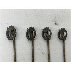 Nine WW2 German lapel pins including five Infantry Assault, Tank Assault etc 