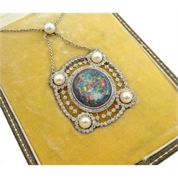 Early 20th century platinum milgrain set black opal, diamond and pearl pendant necklace, the central black opal with openwork diamond set border, each corner set with a pearl, suspending from a pearl and trace link necklace, retailed by Heming & Co, 28 Conduit Street, London, in fitted velvet and silk lined case