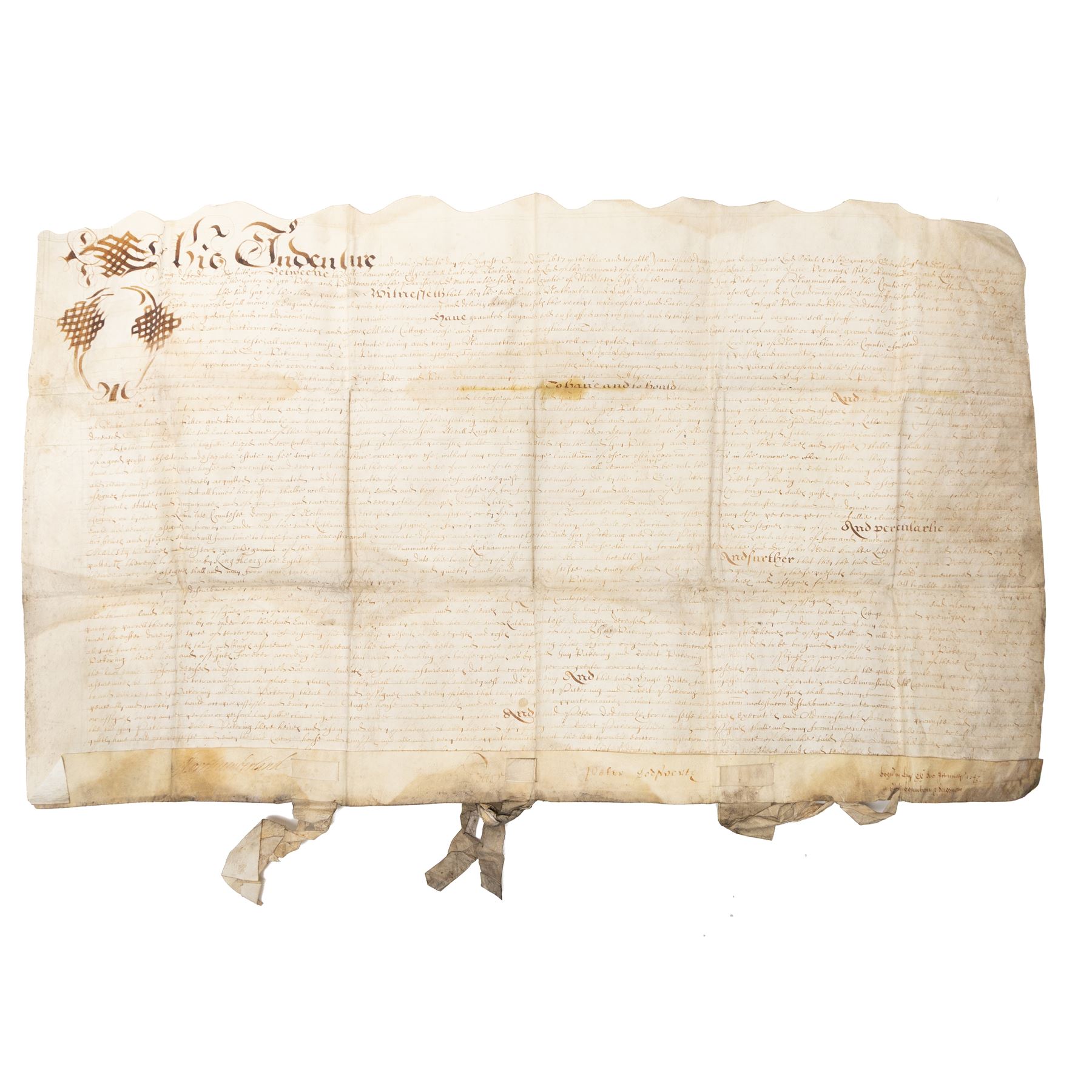 Algernon Percy, 10th Earl of Northumberland: English Civil War period vellum indenture, dated 16 August 1647, between Algernon Percy, Earl of Northumberland and Elizabeth, Countess of Northumberland, relating to a cottage, garth and lands at Hunmanby, Yorkshire, granted to Guy Pickering and Robert Pickering, with reference to Hugh Potter and Peter Dodsworth, manuscript on vellum with decorative initial, pendant seal tag and signatures/witnesses verso

Notes:
Algernon Percy, 10th Earl of Northumberland (1602-1668), was Lord High Admiral to Charles I and later a leading moderate Parliamentarian during the English Civil War. Dated August 1647, this indenture was executed in the aftermath of the First Civil War, while Percy was closely involved in Parliamentary government and in the custody of the King’s younger children. The document concerns property at Hunmanby, Yorkshire, and includes reference to tenure connected with the Crown and King Henry VIII