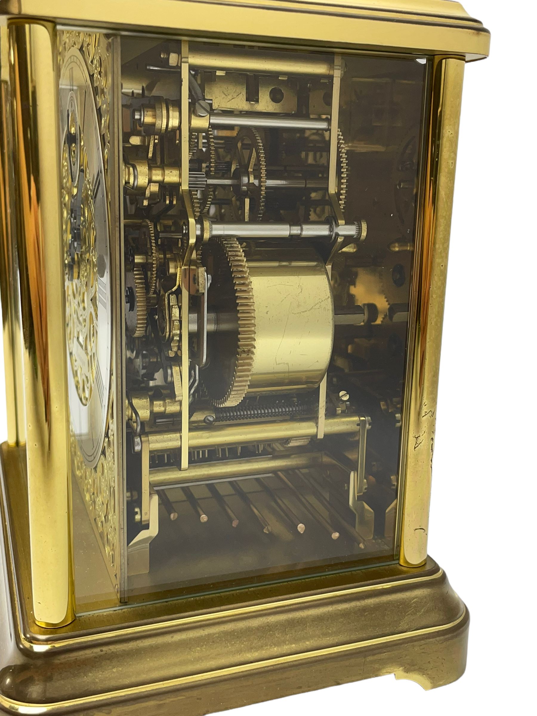 A 20th century brass cased Kieninger (German) chiming mantle clock with