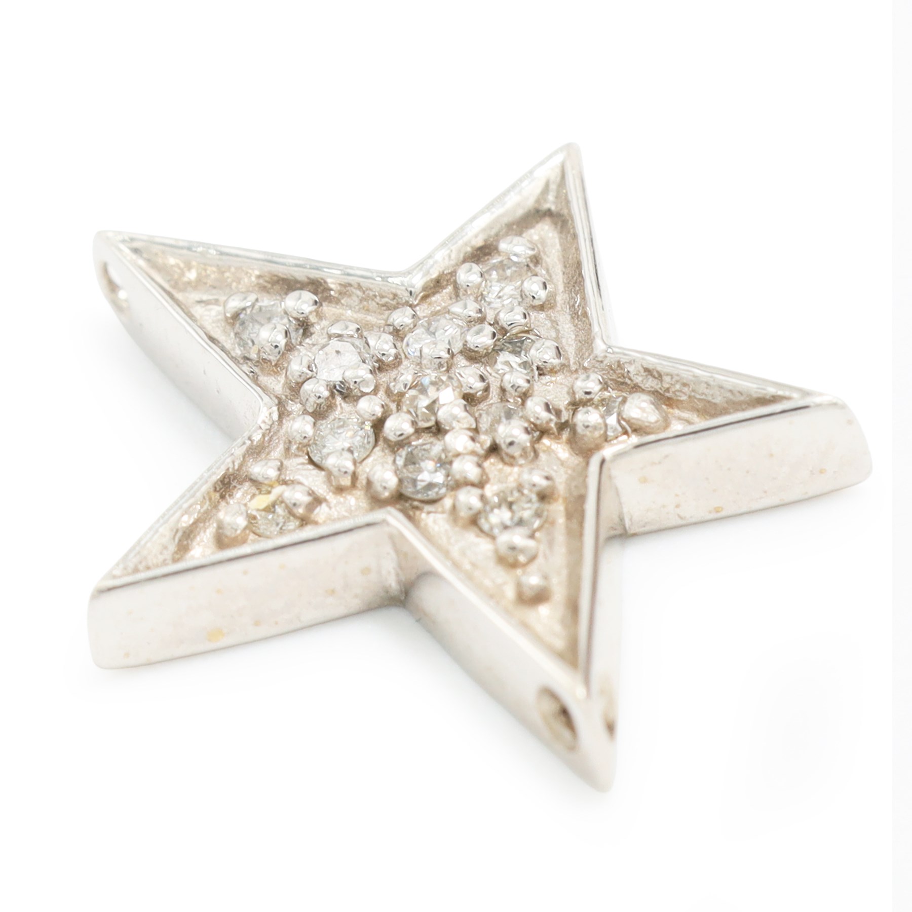 14ct white gold diamond star pendant, pave set with ten round brilliant cut diamonds