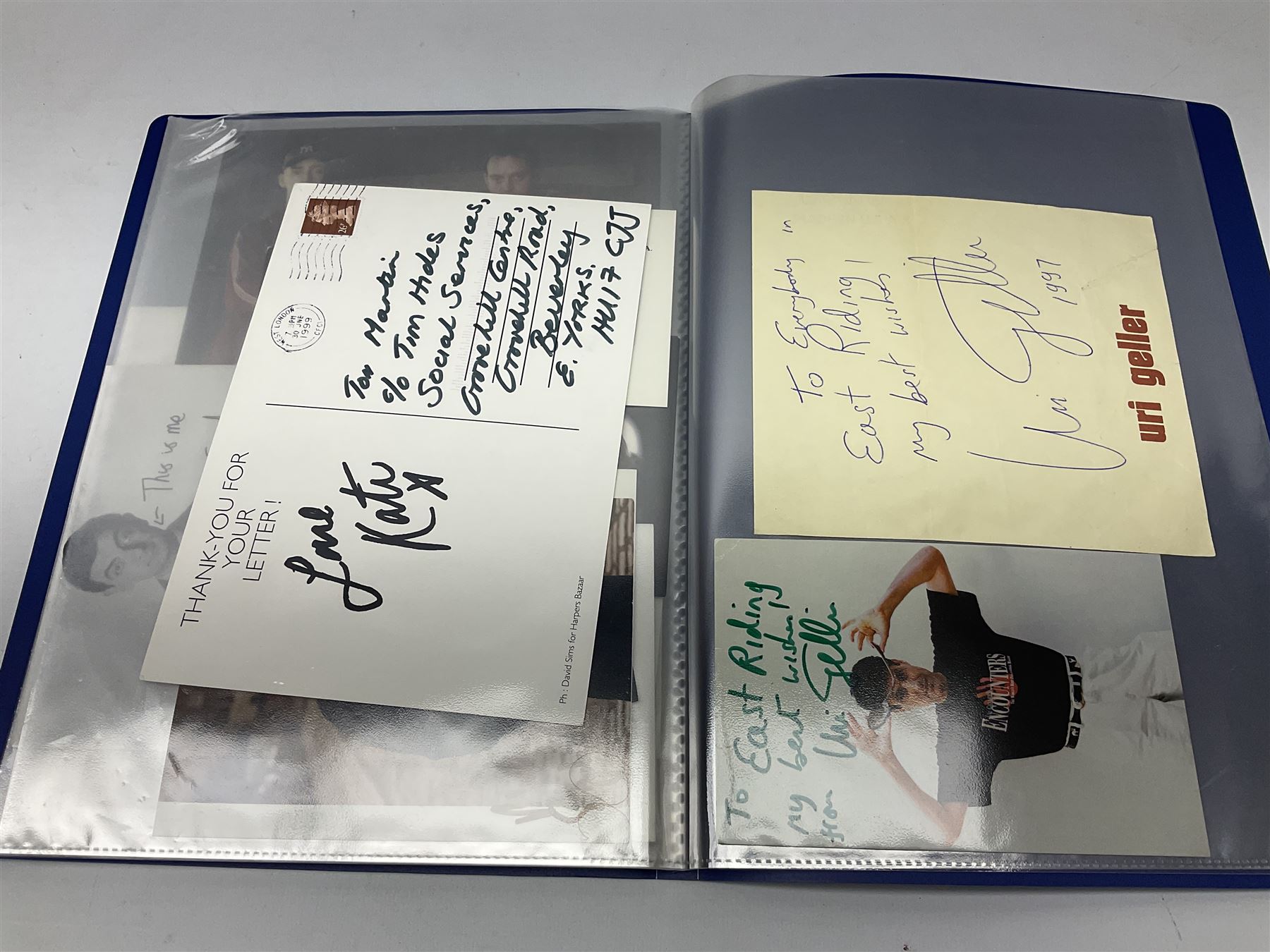 Two folders of over fifty photographs, cards, compliment slips etc of actors, actresses, celebrities, politicians, sports personalities etc, all bearing signatures, including David Frost, Lloyd Grosman, John Suchet, Julia Somerville and othe GMTV presenters, Carol Vorderman, Jackie Collins, Rolf Harris, Timothy Dalton, Pete Postlethwaite, Magnus magnusson, John Major, Kate Moss, Uri Geller, David Beckham, Peter Alliss, Sharon Davies, Kevin Keegan etc