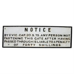 Cast iron railway sign reading 'NOTICE BY 8 VIC.CAP.20.S.75 ANY PERSONS NOT FASTENING THIS...