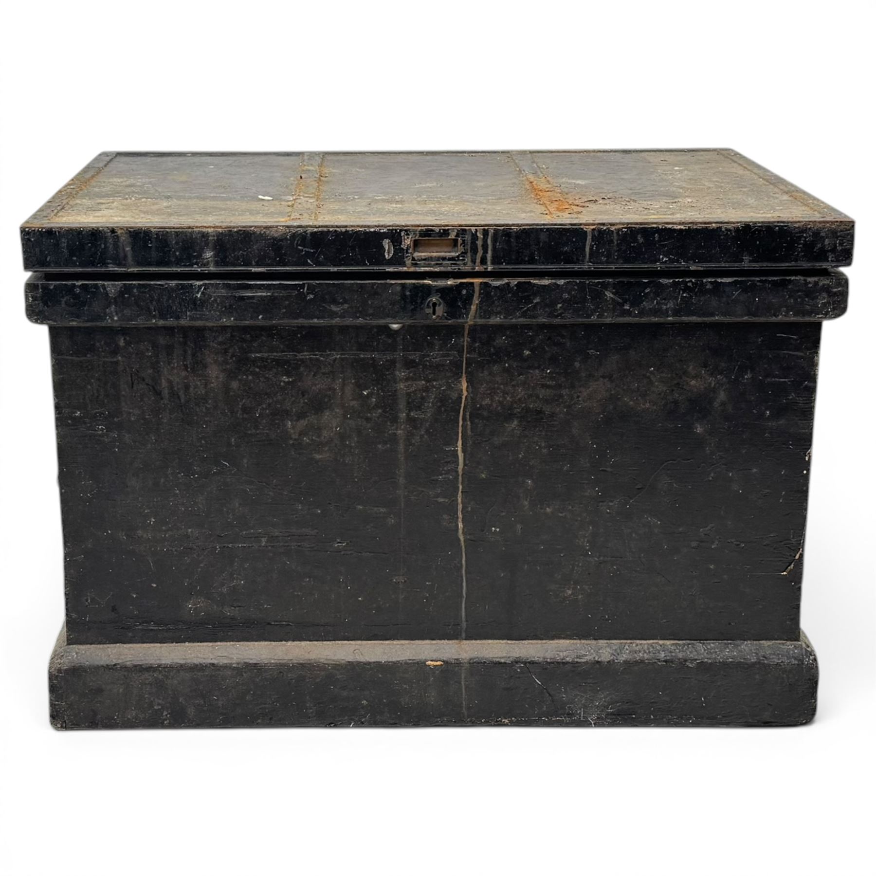 20th century black painted camphorwood lined tool chest, rectangular hinged lid over moulded edge, black painted exterior with iron straps and carry handles, the interior fitted with sliding lidded trays and drawers with turned handles, containing an assortment of hand tools