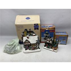 Christmas decorations; Premier LED Christmas Village scene with moving train, together with three Lumineo christmas scenes, and other similar 