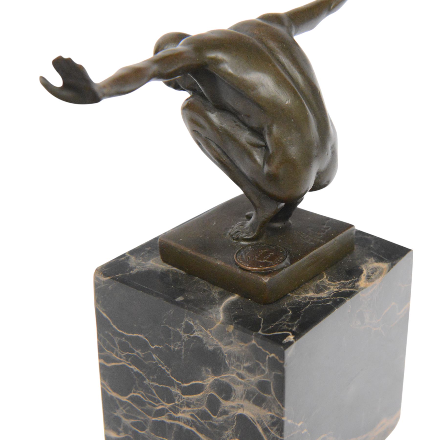 After Miguel Fernando Lopez Power of Silence, modelled as a athlete crouched with arms outstretched, signed Milo, upon a marble plinth, H15cm