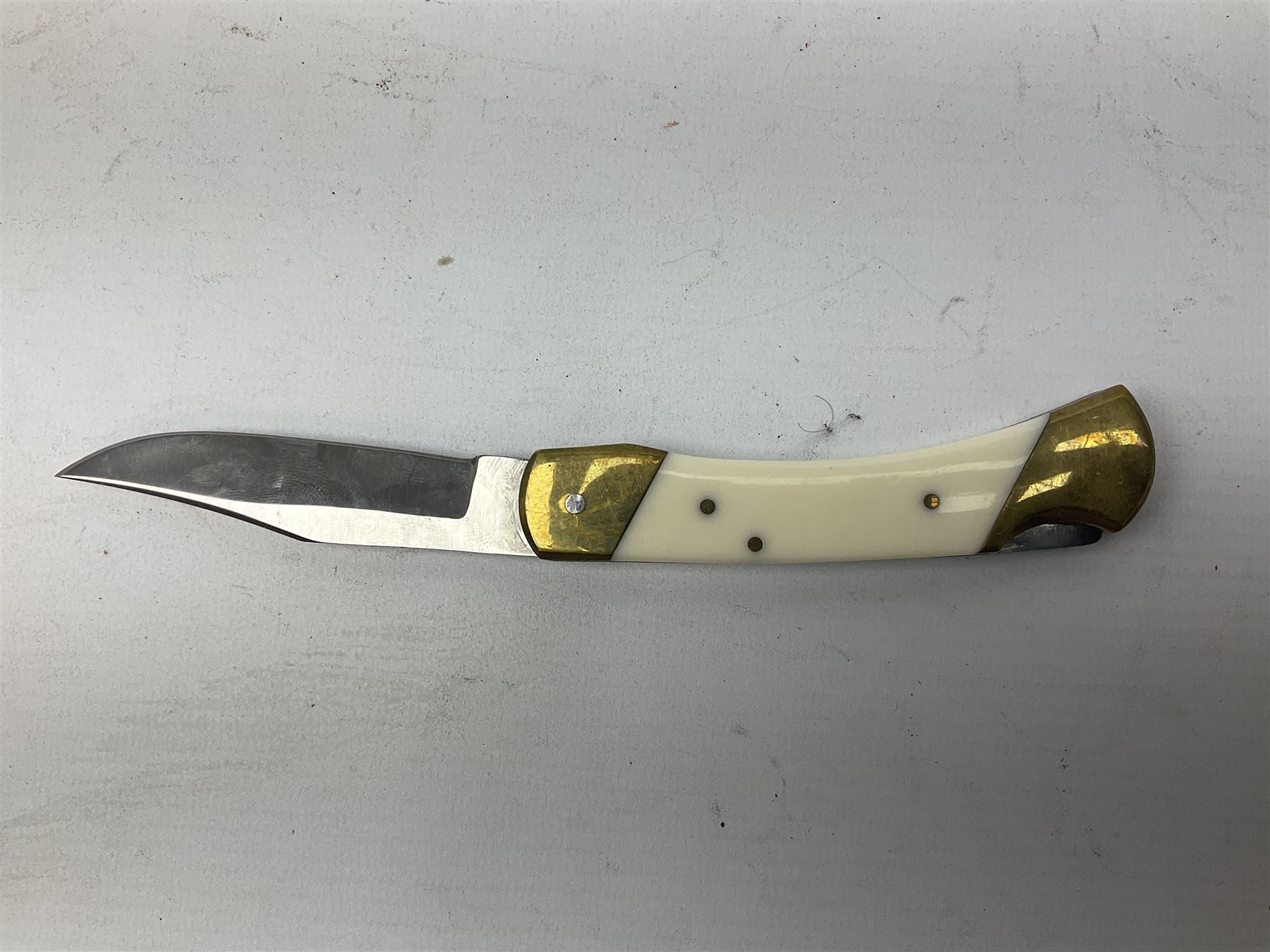 Nine pocket knives including two Ravi folding knives, Richards of Sheffield single blade folding knife etc