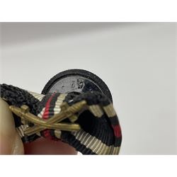 Four German awards - pre-WW2 two-position button hole ribbon for 1914 Iron Cross; WW1 wound badge open back cut-out version with silvered finish; miniature version Mother's Cross with ribbon bow; and The Eastern Medal, officially the Winter Battle in the East 1941–42 Medal (4)