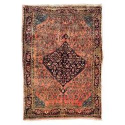 Persian Zanjan pale red ground rug, lozenge medallion and field decorated with floral Herati motifs, the border decorated with stylised plant motifs and trailing branches, floral pattern guard stripes