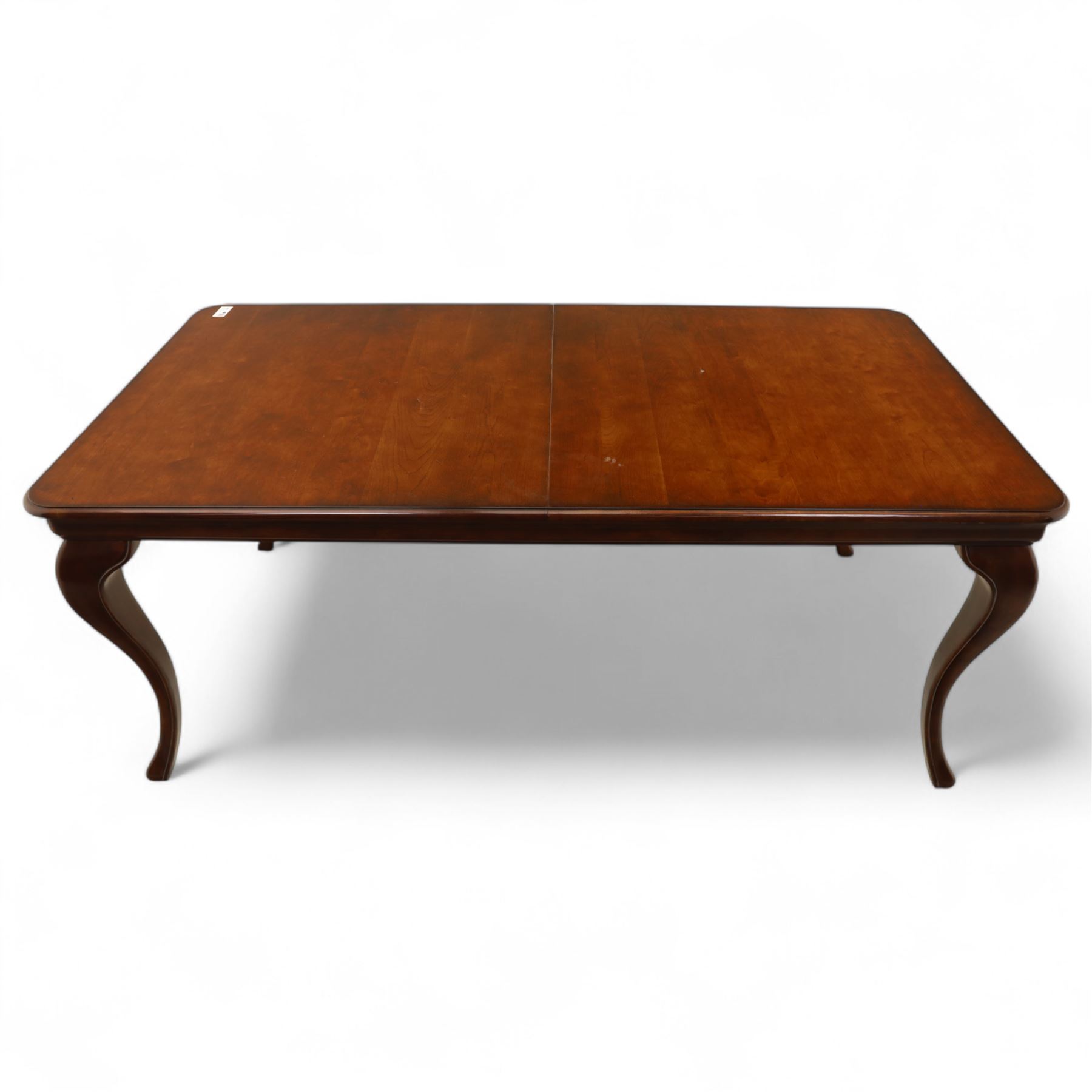 Willis & Gambier - mahogany extending dining table, rectangular top with rounded corners on cabriole legs, with two 35cm extension leaves, four Willis & Gambier upholstered high back chairs and four mahogany chairs, upholstered in a stripped multi-coloured velvet fabric, with scroll-shaped top rail, lyre-shaped back splat on cabriole legs, chairs W46xD91x97cm (11) 