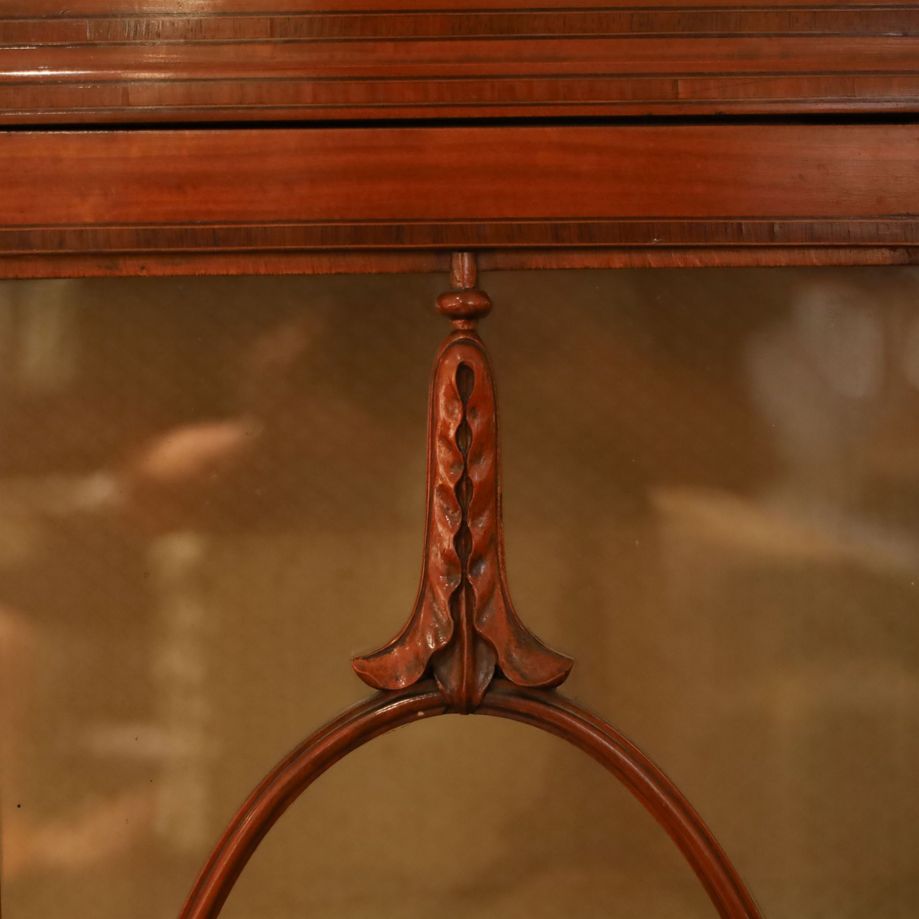 Edwardian satinwood display cabinet, satinwood crossbanded top, with central astragal glazed cabinet, baized lined shelves, raised on tapering supports terminating in spade feet