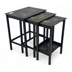 Early 20th century black lacquered nest of tables, in chinoiserie style, the largest table...