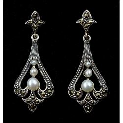 Pair of silver three stone pearl and marcasite openwork pendant stud earrings, stamped 925 
