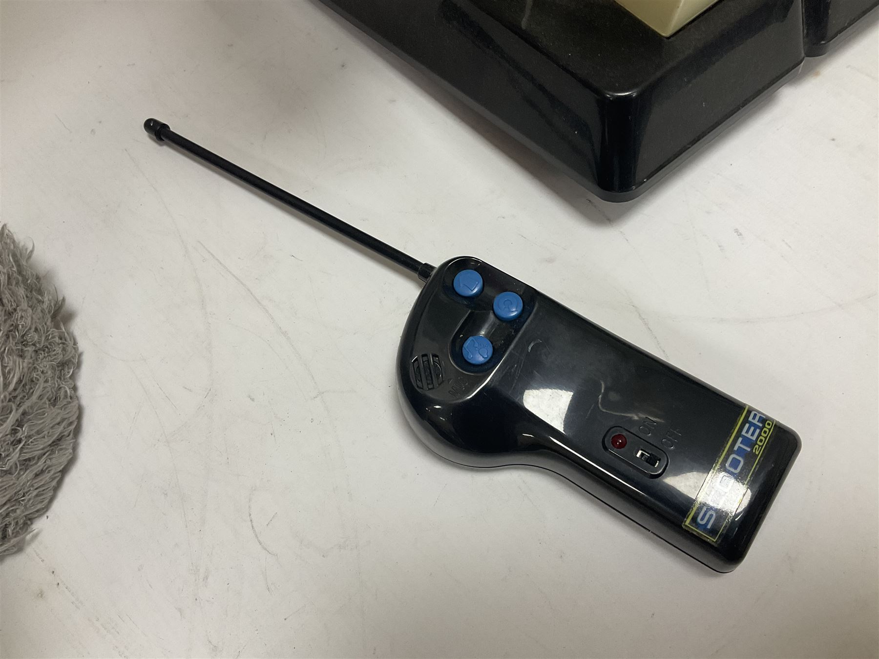 Scooter 2000 plastic battery operated remote control waiter robot with tray and remote control unit; together with a large 'Me To You' floor standing teddy bear (2)