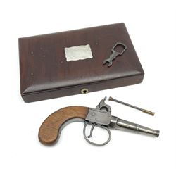 Scratch-built copy of a 19th century percussion cap pistol with 7cm tapering cannon style turn-off barrel, lock-plate inscribed 'F. Fox' and mahogany bag stock L17.5cm overall, in fitted mahogany box with inlaid crest chased mother-of-pearl cartouche and double-ended spanner