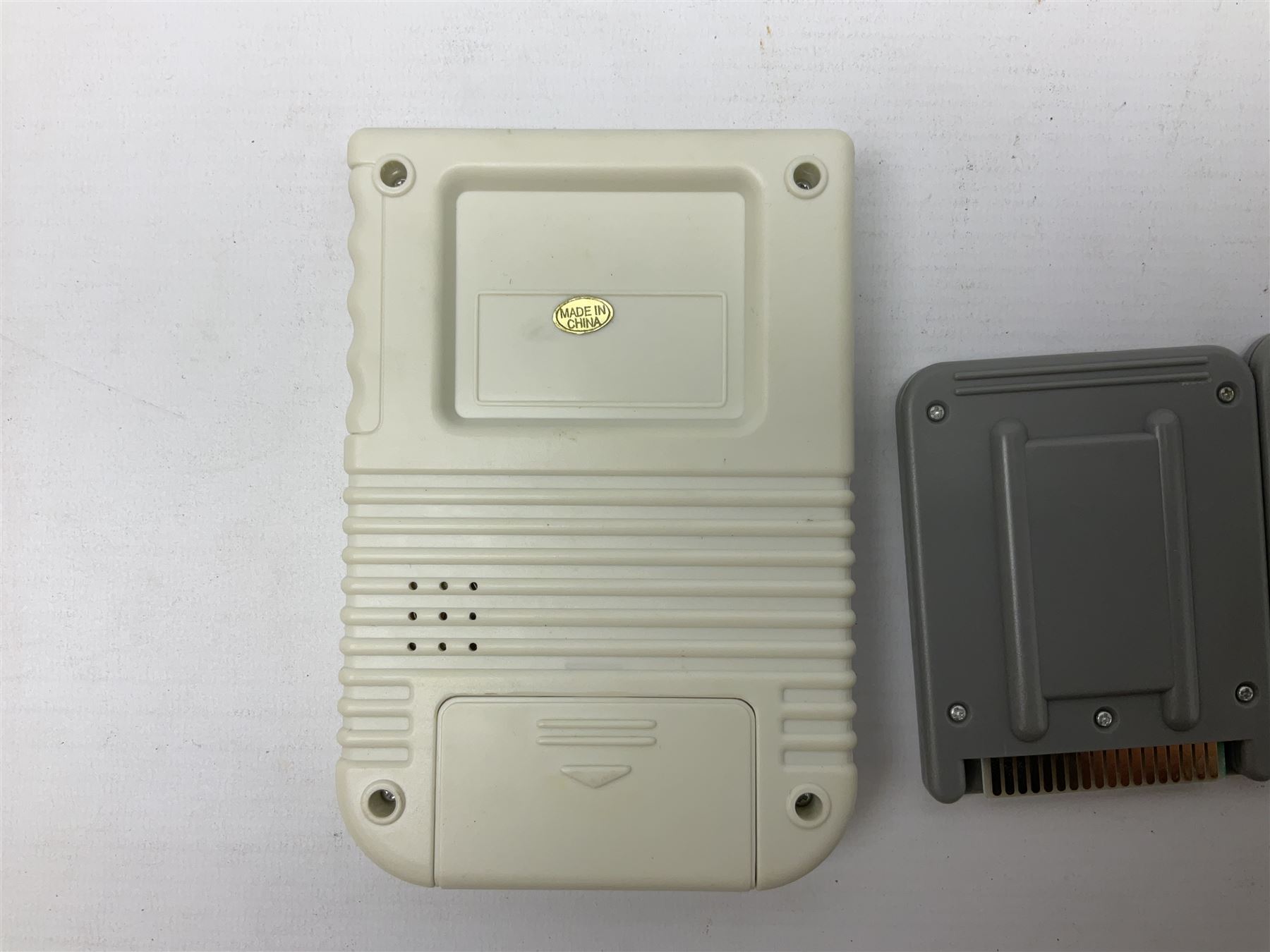 Collection of retro handheld games, including Nintendo Game & Watch ‘Snoopy Tennis’ (1982) and ‘Squish’ (1986) both with instruction booklets, Casio CG-600 ‘Star Invader’ with box, 3 in 1 LCD cartridge game including ‘Soccer’, ‘Invader’ and ‘Bomb Finder’ games, and two Grandstand ‘Pinball Wizard’ (1988) games, both with original boxes