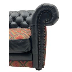Barker and Stonehouse - chesterfield armchair, upholstered in buttoned black leather and red and green geometric pattern fabric, studded detail 