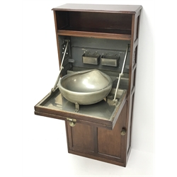  19th century mahogany military campaign washstand, folding front with tin wash bowl, above a door with removable waste water container, on a plinth base, W55cm, D22cm, H125cm  