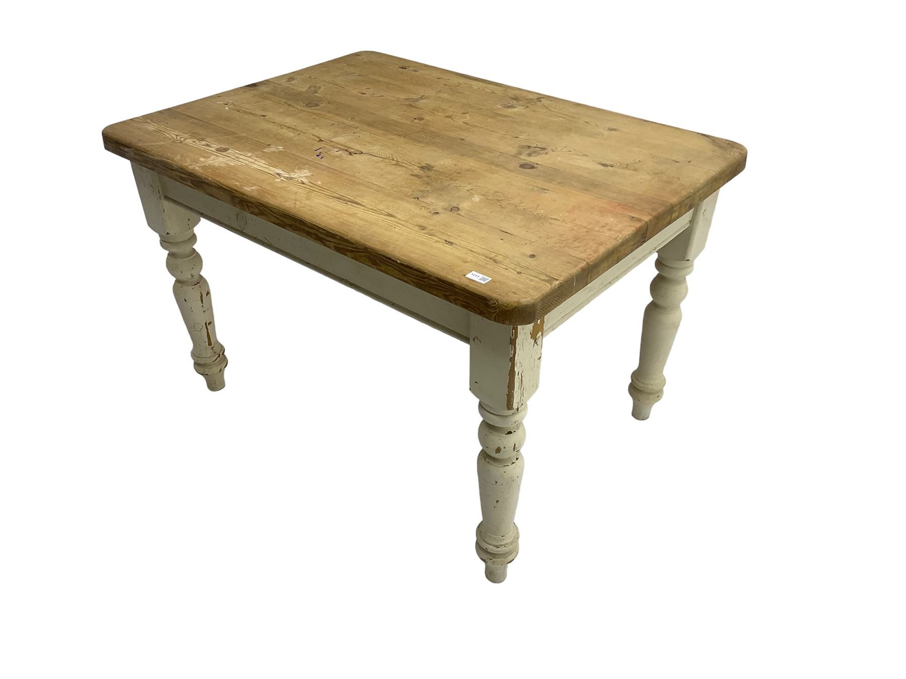 Traditional pine kitchen table with white painted base, rectangular top over single drawer, raised on turned supports