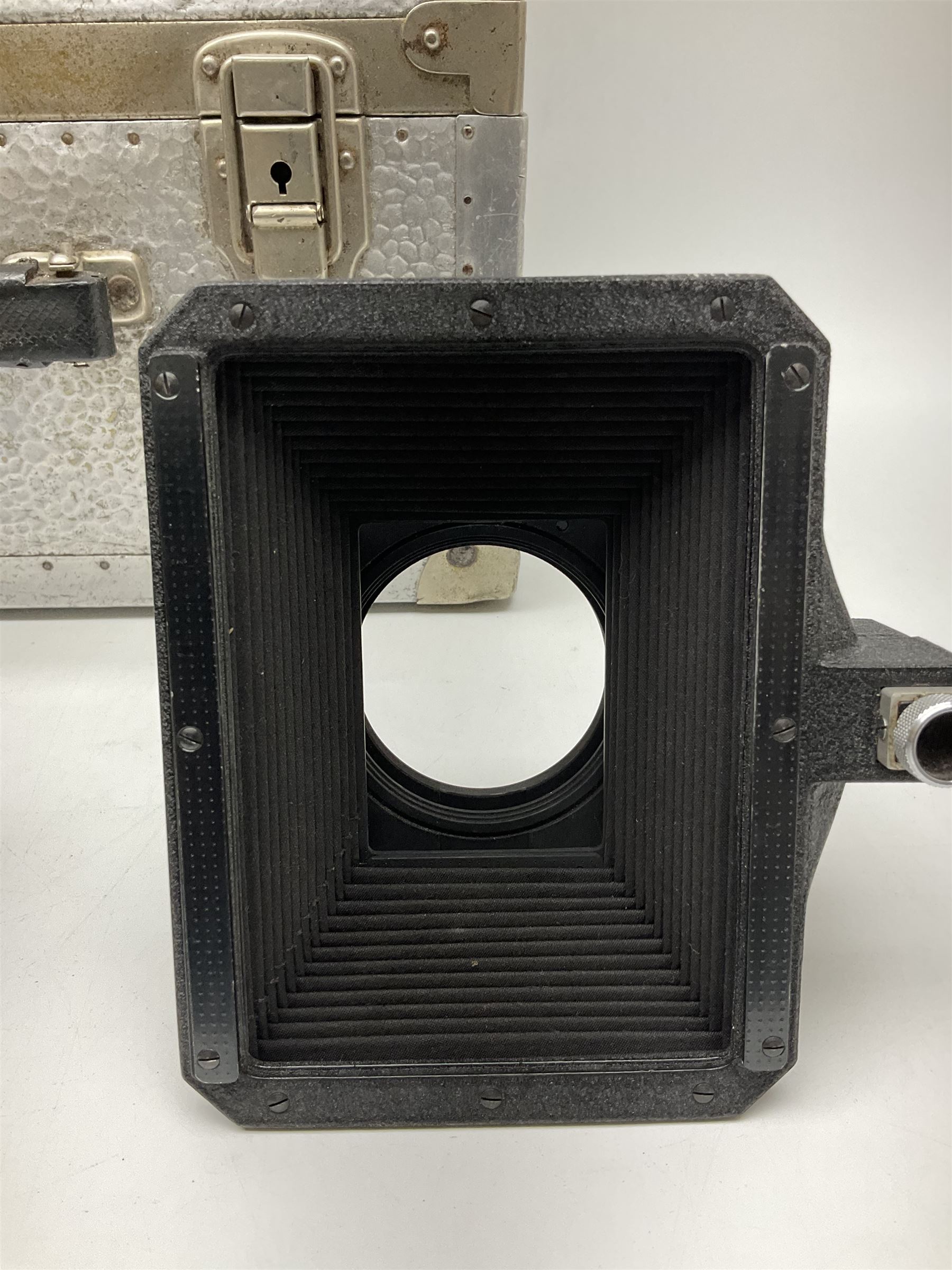 Arriflex 16SB camera body, serial no. 1784, with ' Carl Zeiss Distagon 1:2 f=8mm' lens, serial number 3860224, 'Carl Zeiss Jean Tessar 2/16' lens, serial no 3624355, camera pistol grip and other accessories, in fitted hard case