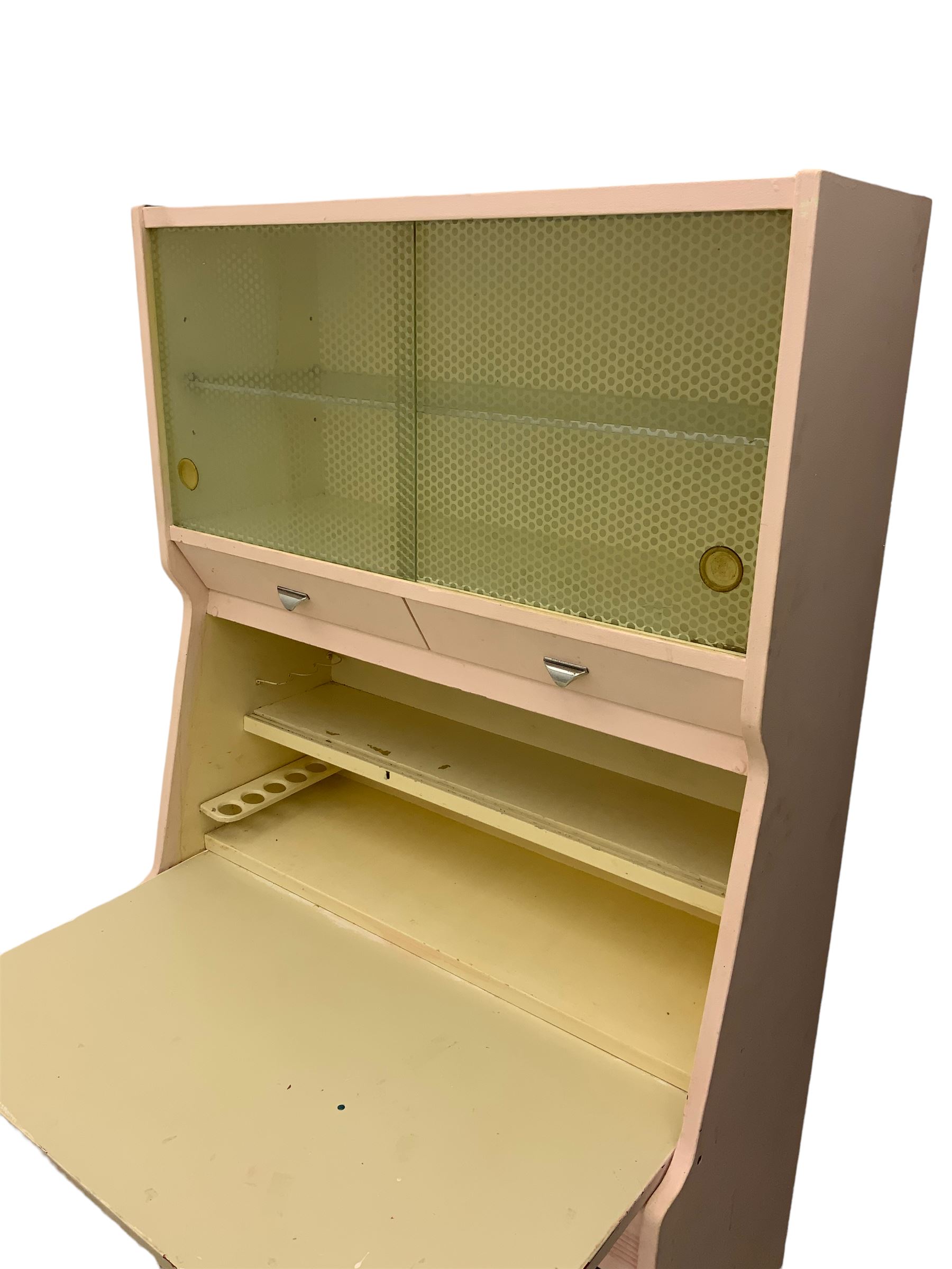 Hygena - mid-20th century painted kitchen cabinet, glass sliding doors, above fall front preparation surface, two sliding cupboards to base