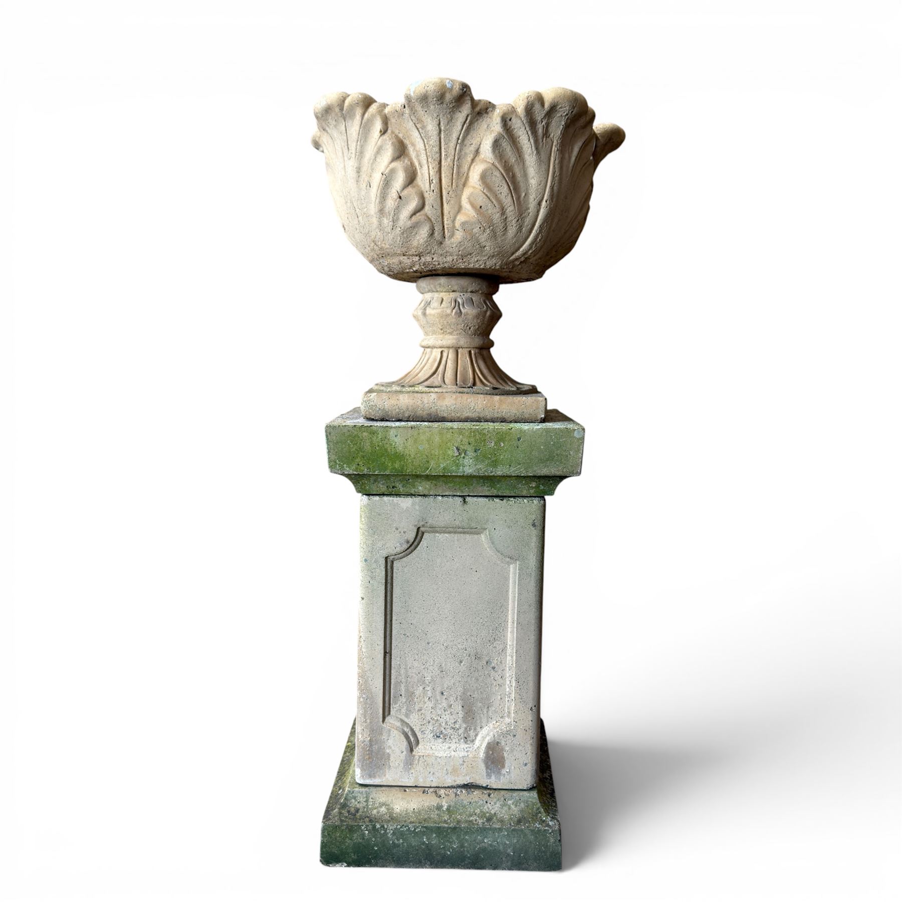 Cast stone five sectional urn on plinth, squat leaf and petal design urn on square base