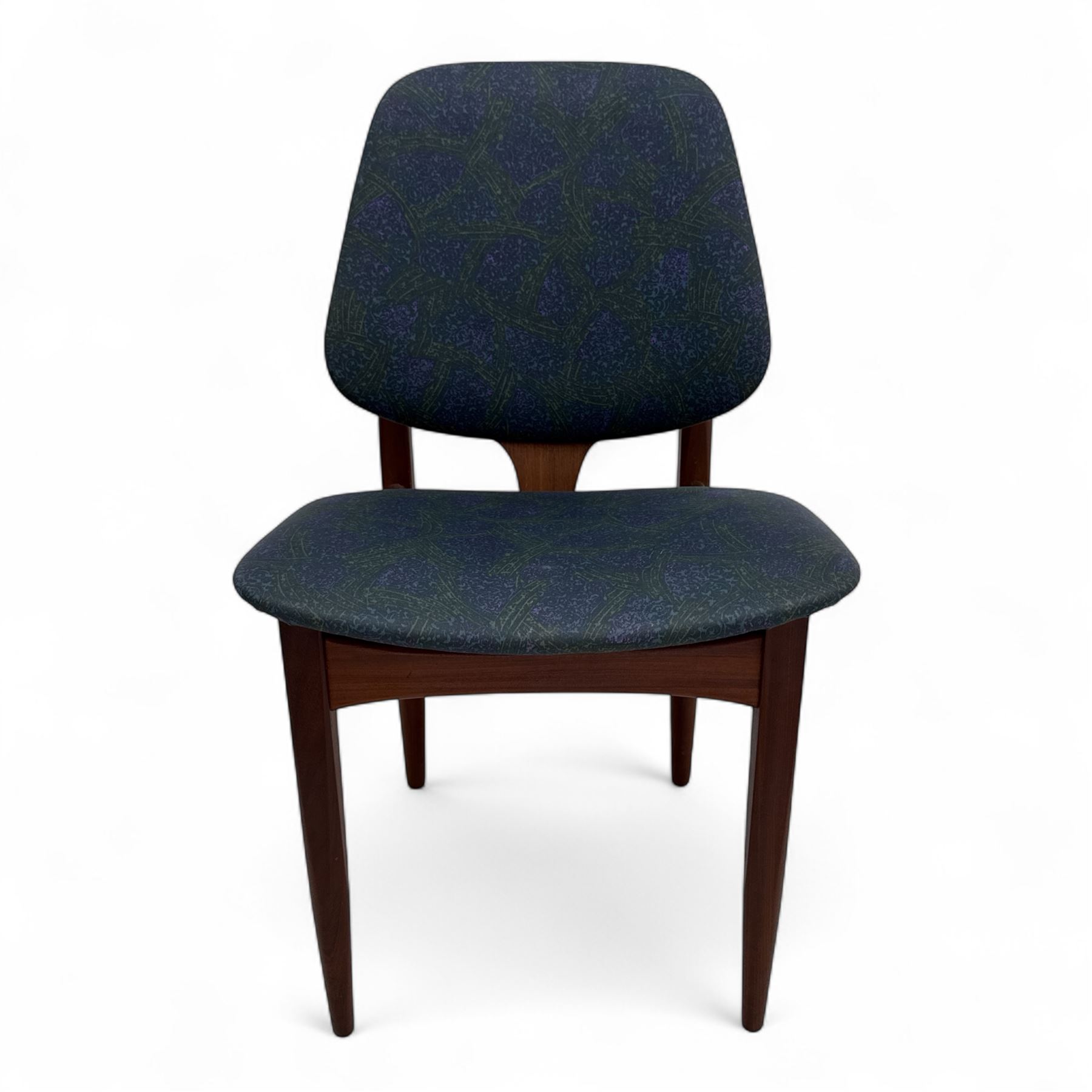 G-Plan - mid-20th century teak oval dining table, with butterfly leaf extension mechanism and four Elliot's of Newbury teak framed dining chairs upholstered in purple and green fabric, table un-extended width 152cm x depth 152cm x height 71cm, chairs 47x37x78cm 