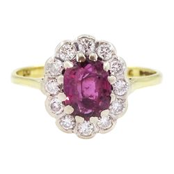 18ct gold oval cut ruby and round brilliant cut diamond cluster ring, hallmarked