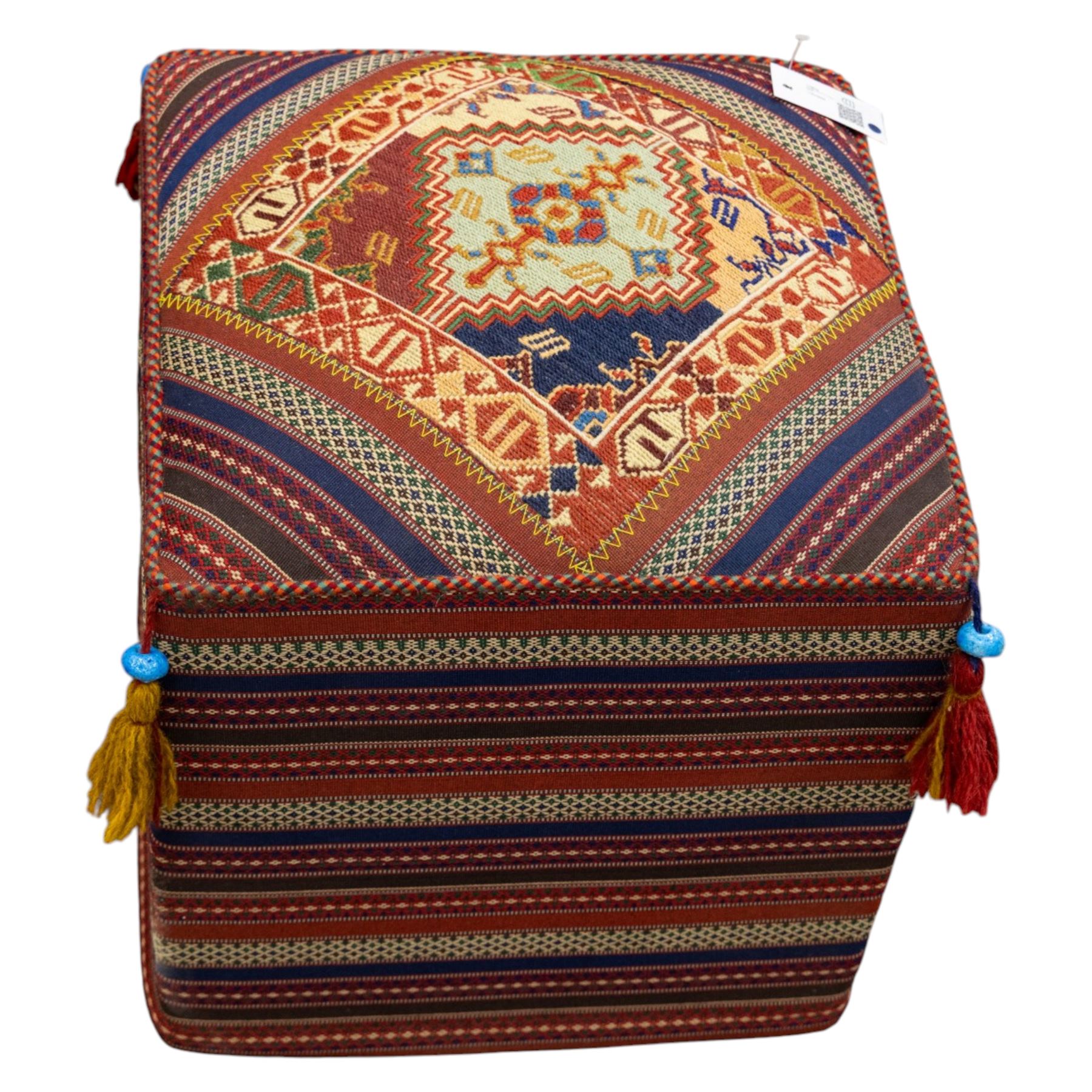South West Persian Qashqai stool, square flatwoven top with central geometric medallion enclosed within a stepped border the sides decorated with striped bands of geometric motifs with tasselled corners 