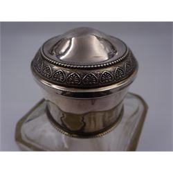 Early 20th century French silver mounted glass scent bottle, the faceted rectangular glass body etched with swags of flowers united by ribbons, with cylindrical silver cover embossed with foliate detail and beaded decoration with gilt interior, marked with Minerva's head, with white metal collar and glass stopper, H17cm