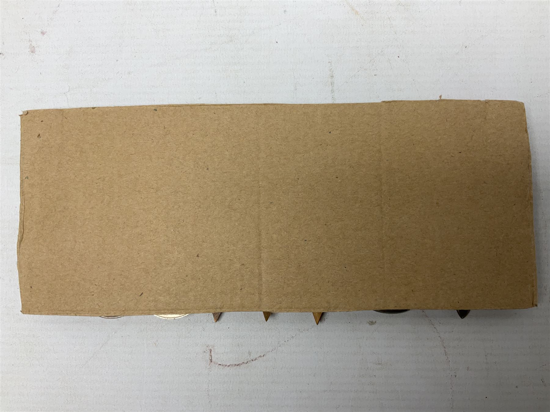 WW2 Royal Naval group of eight medals comprising OBE, hallmarked silver Distinguished Service Cross inscribed verso Lieut. J.R. McCluskie RNVR 1945, 1939-1945 Star, Atlantic Star, Africa Star, 1939-1945 War Medal, Defence Medal and Royal Naval Patrol Service Medal inscribed Lieutenant J.R. McCluskie Royal Naval Patrol Service; with seven original photographs of a sea battle 27th November 1940 against the Italian Fleet and another photographic postcard of Sir Stafford Cripps arriving on board one of the vessels.