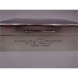 Mid 20th century silver mounted cigarette box, of rectangular form, with presentation engraving to body reading 'From The Captain and Officers HMS Rocket 1960 - 1962', with engine turned decoration to hinged cover opening to reveal a softwood lined compartmentalised interior, hallmarked S J Rose & Son, London 1961, H4.5cm, W13.3cm, D8.8cm