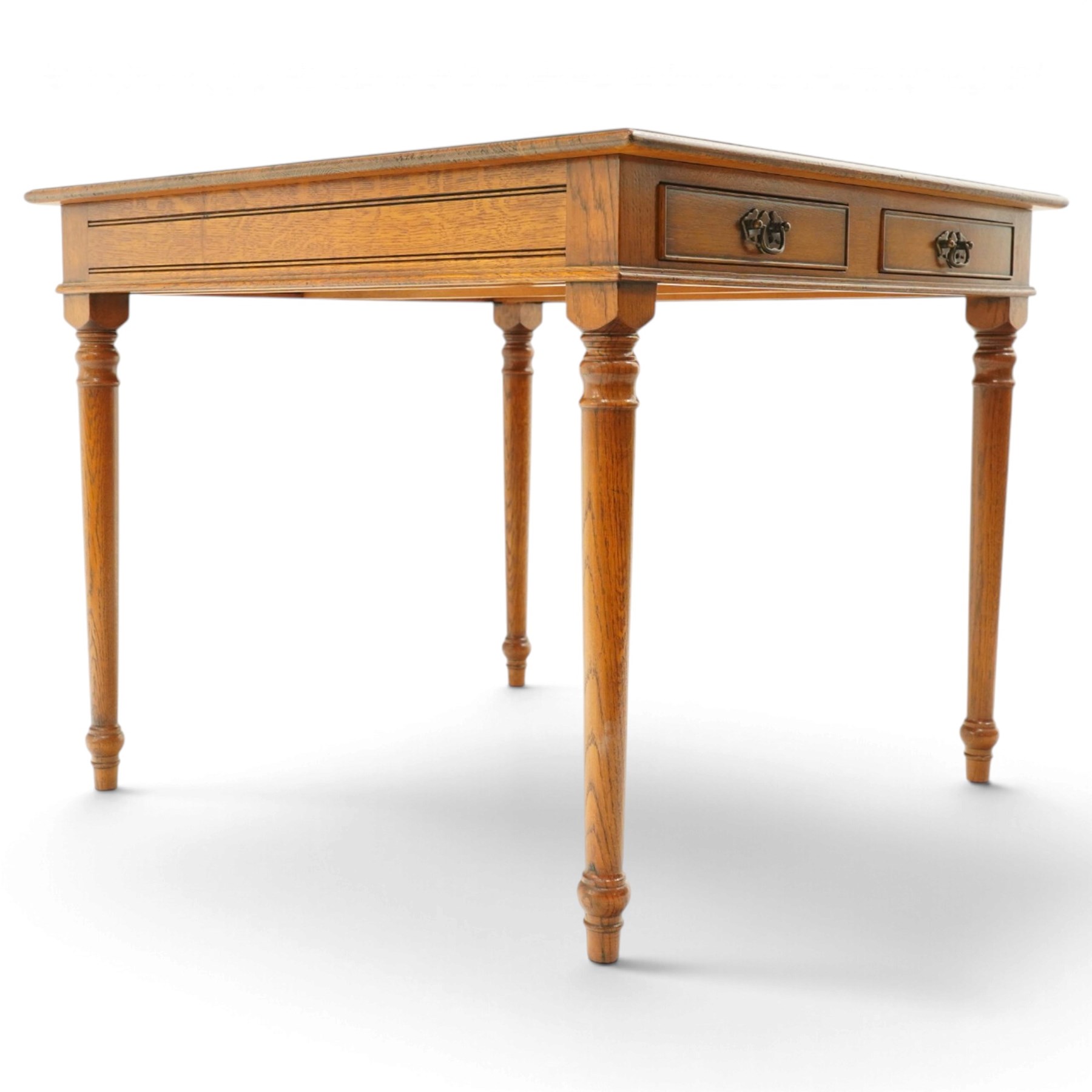 Georgian design honey-oak breakfast table of square form, the moulded edge fitted with two cock-beaded drawers, raised on turned and tapering supports