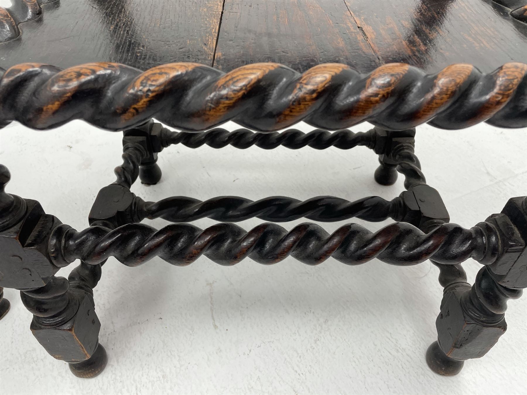 Unusual pair late 17th century oak spindle-back chairs, barley twist or spiral turned throughout, the back with a row of six vertical turned spindles, the supports joined by two lower rails and front central rail, plank seats

Provenance - The chairs illustrated in 'Early British Chairs and Seats 1500-1700' by Tobias Jellinek (Pub: Antique Collectors Club. 2009. p 313). Previous part of a private collection. Vendor purchased from auction 2014.

Measurements - seat width - 48cm, seat height - 38cm/36cm, depth - 50cm, total height - 85cm/82cm
