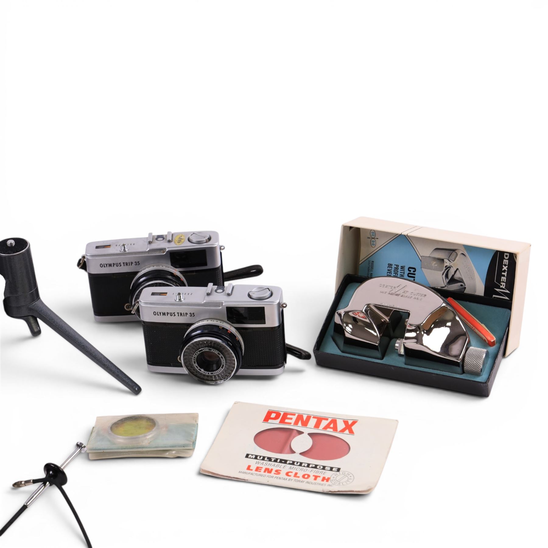 Camera accessories including Leitz projector lens, etc and two Olympus trip 35mm cameras