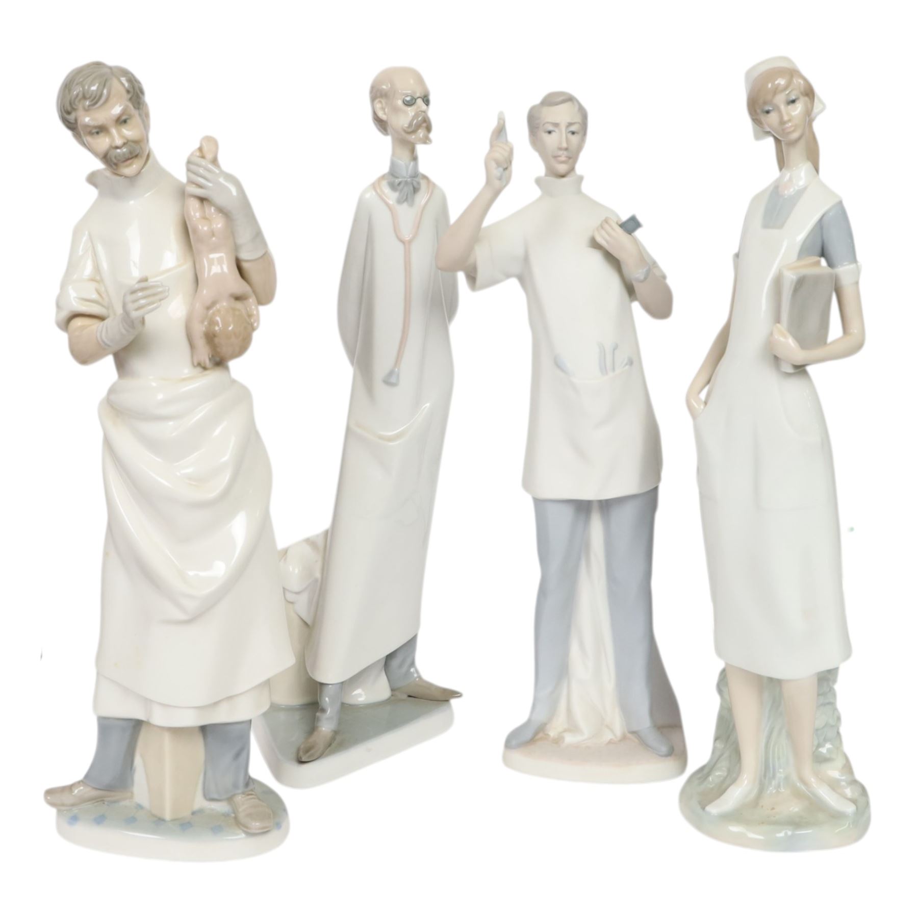 Four Lladro figures, comprising Obstetrician 4763, The Doctor 4602, Nurse 4603 and Dentist matt 4762 