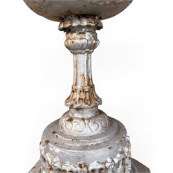 Small ornate painted 19th-century Meadow Foundry cast iron centrepiece urn, with wide, scalloped bowl rim decorated with a repeating egg and dart decoration, supported on a slender fluted pedestal with raised quatrefoil design on an octagonal plinth base  
