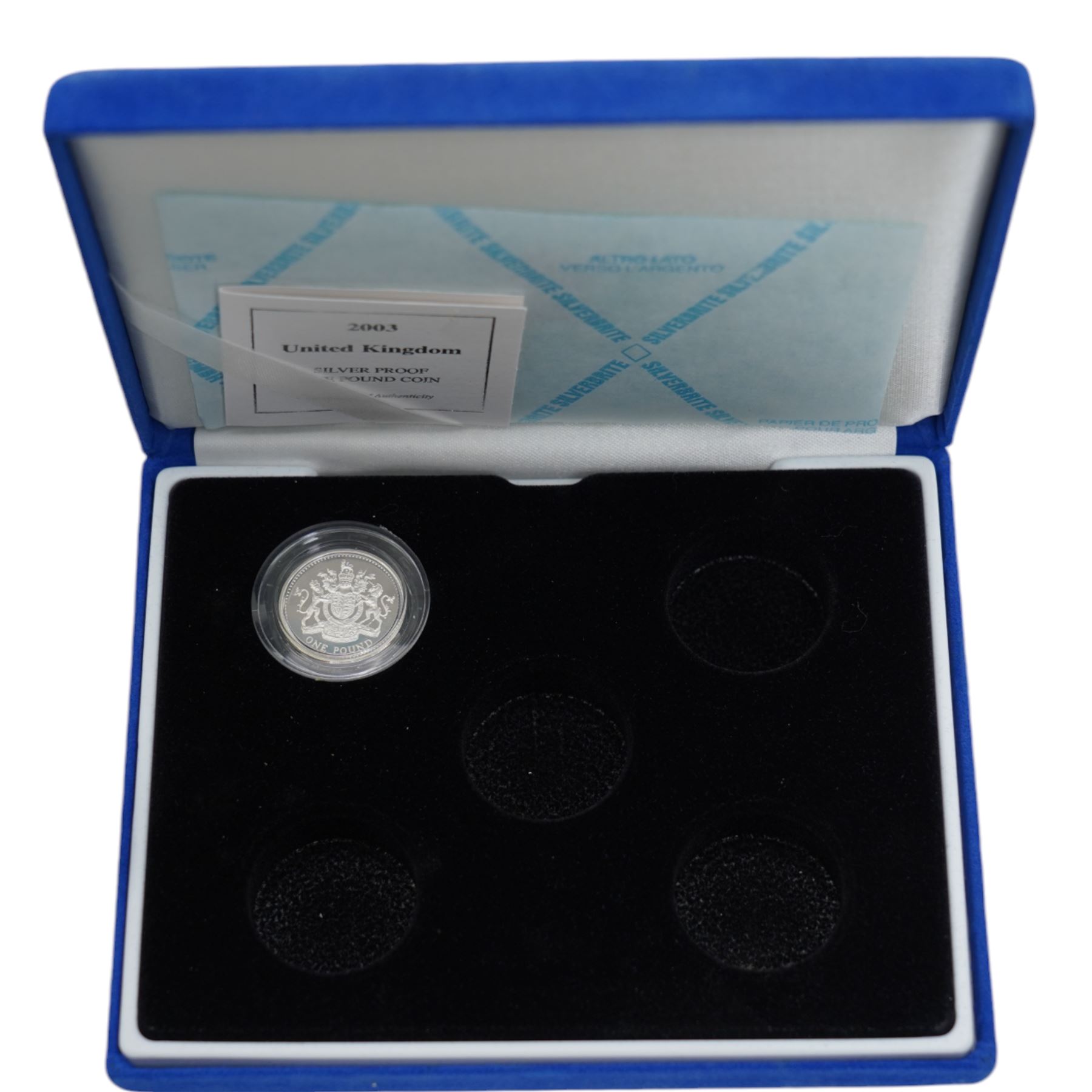 Eight The Royal Mint United Kingdom silver proof coins, comprising 1980 crown (2), 1981 crown (3), 1983 one pound, 1989 two pound two coin set, 2003 one pound, mostly cased with certificates, together with two Isle of Man 1977 silver proof crown coins issued by the Pobjoy Mint