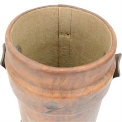 Early 20th century leather artillery shell case by Barrow, Hepburn & Gale Ltd, decorated a transfer printed coat of arms and an impressed N, with a strap handle, the base stamped 'No 58 III BH & G Ltd, together with another artillery shell case