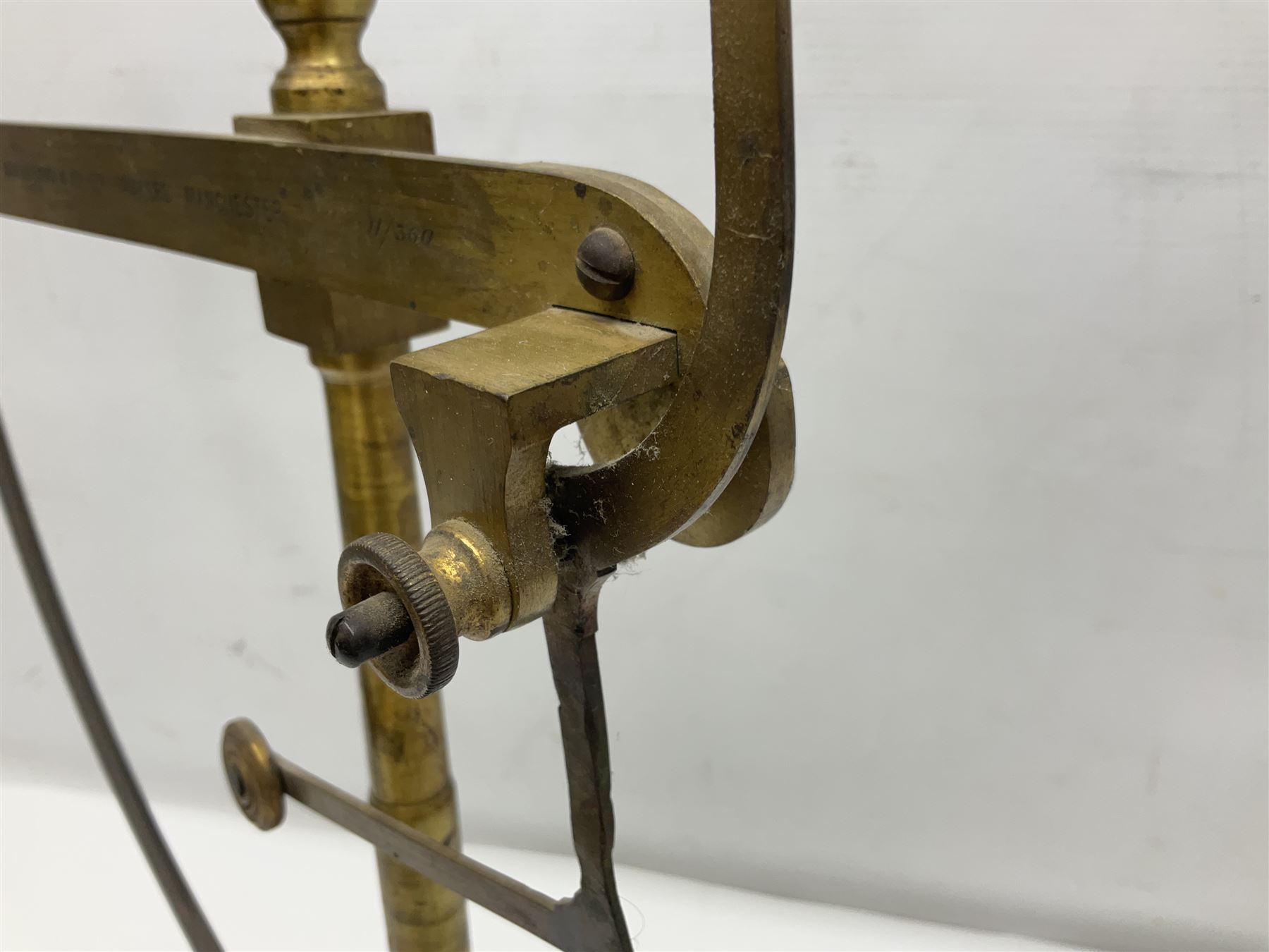 Victorian brass yarn scale by Goodbrand & Co, Manchester on cast iron tri-form base, H56cm