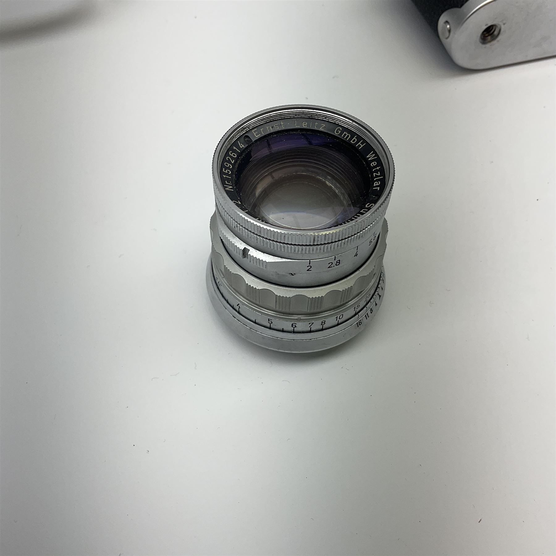 Leica M3 camera body, 1959, chrome finish, serial number '986937', fitted with 'Ernst Leitz GmbH Wetzlar Summicron f=5cm 1:2 Nr.1592614' lens, with Leica M3 instruction booklet