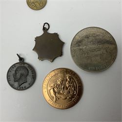 RMS Lusitania iron medallion dated 5th May, 5.5cm diameter, boxed with St Dunstan's Blinded Soldiers Profit paperwork; another unboxed similar Lusitania medallion; 30th Corps Alamein Cuxhaven medallion; Battle of Jutland 1916 silver memorial pendant; Navajo Code Talkers medallion 2000; and five other military related medallions