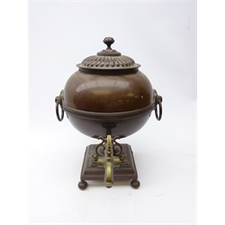  George III copper tea urn of globular form, reeded domed cover, ring handles, shell motif girdle, stepped square base on four ball feet, stamped Clarks' Fleet St. H43cm   