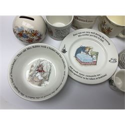 Collection of Royal Doulton Bunnykins and Wedgwood Peter Rabbit nursery ware, including cups, bowls, money boxes, etc 