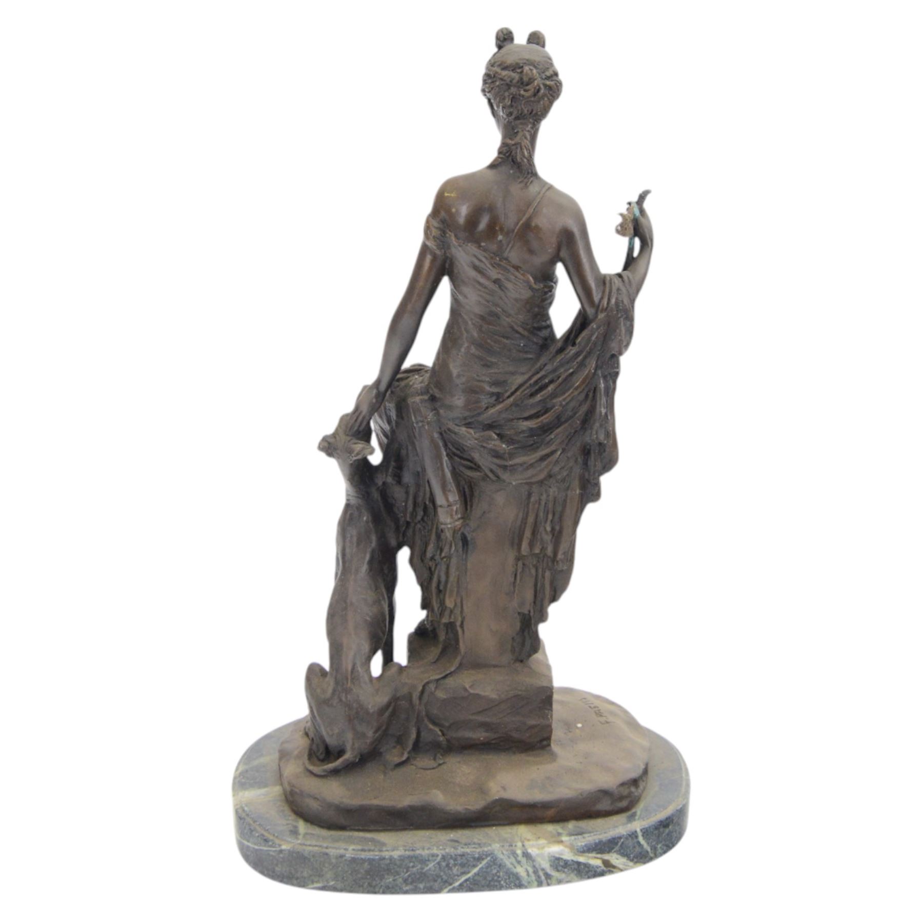 Bronzed figure 'Diana with a Dog', signed F.Preiss, upon an oval marble plinth, H46.5cm