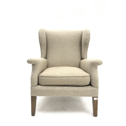 Vintage Parker Knoll wing back armchair, upholstered in natural fabric, W75cm, H97cm